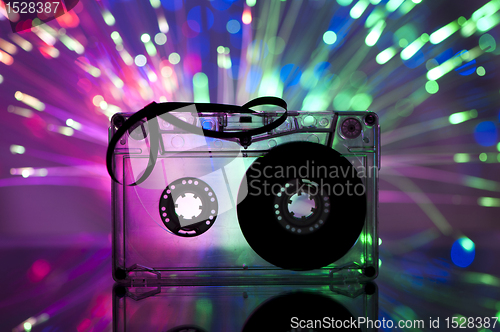 Image of Cassette tape and multicolored lights