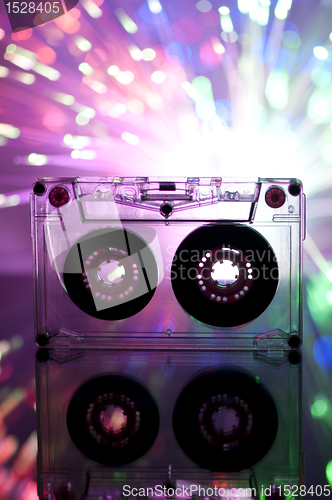 Image of Cassette tape and multicolored lights