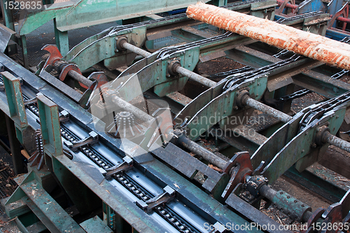 Image of Lumber industry - cutting line in saw mill 