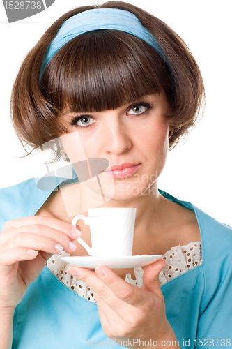 Image of woman enjoying a cup of coffee