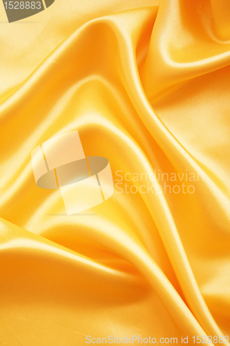 Image of Smooth elegant golden silk as background 