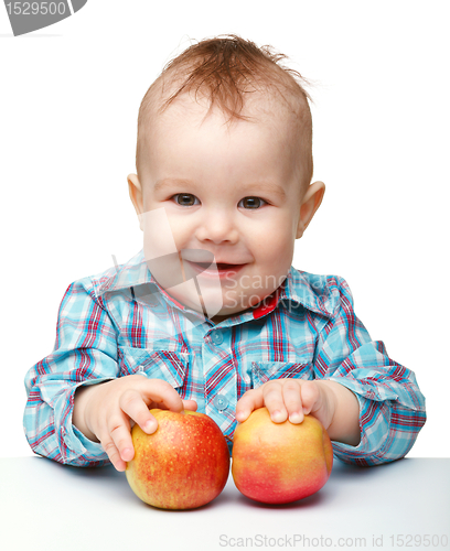 Image of Little child with apple