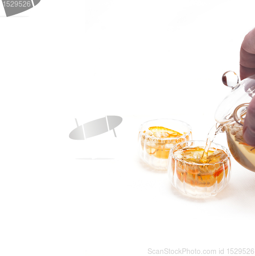 Image of floral tea set over white