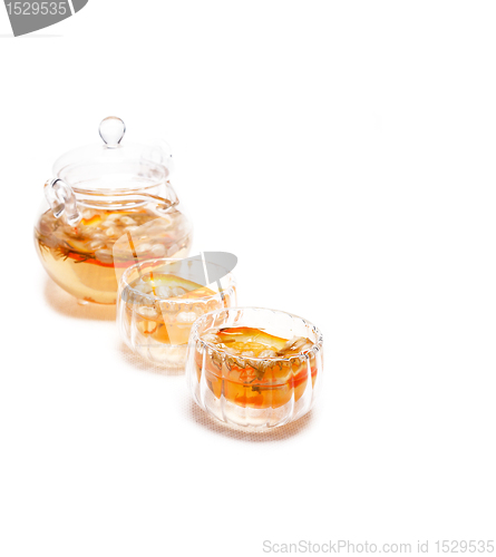 Image of floral tea set over white