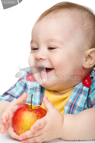 Image of Little child with apple