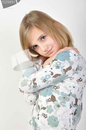 Image of cute blond girl posing