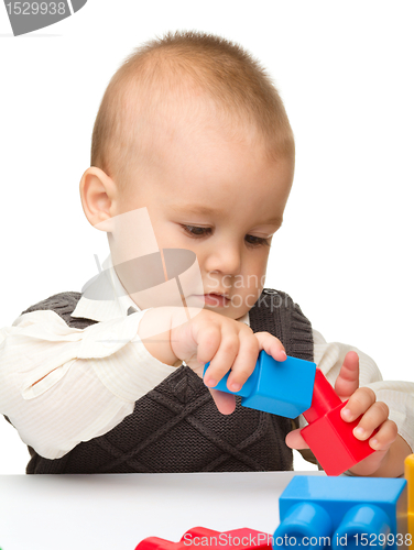 Image of Little boy with building bricks