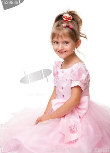 Image of Cute little girl in pink dress