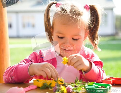 Image of Cute little girl on playground