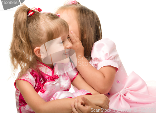Image of Two little girls are chatting