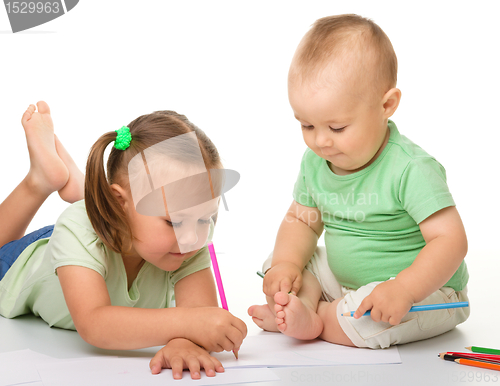 Image of Two children are drawing