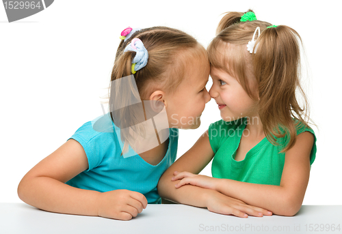 Image of Two little girls are having fun