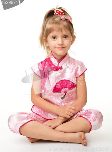 Image of Cute little girl in pink ba ba shirt (Vietnamese)