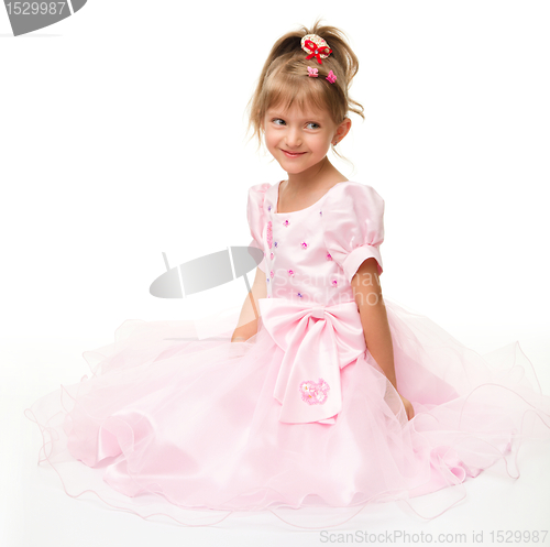 Image of Cute little girl in pink dress
