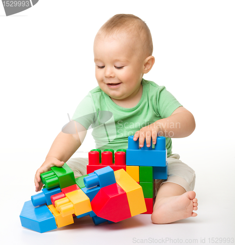Image of Little boy with building bricks