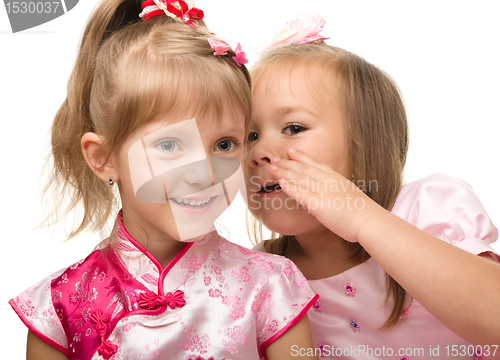Image of Two little girls are chatting