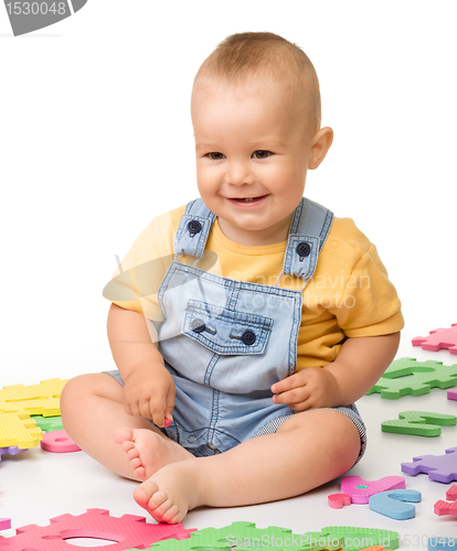 Image of Little boy play with alphabet