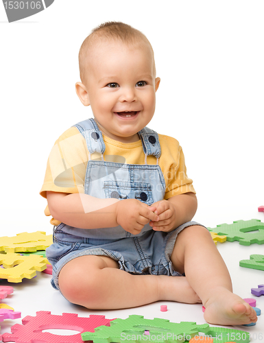 Image of Little boy play with alphabet