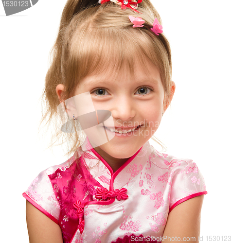 Image of Cute little girl in pink dress