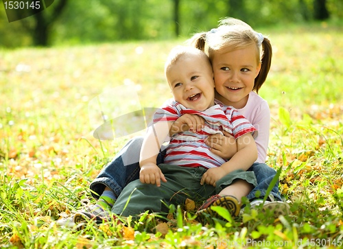 Image of Children are playing in autumn park