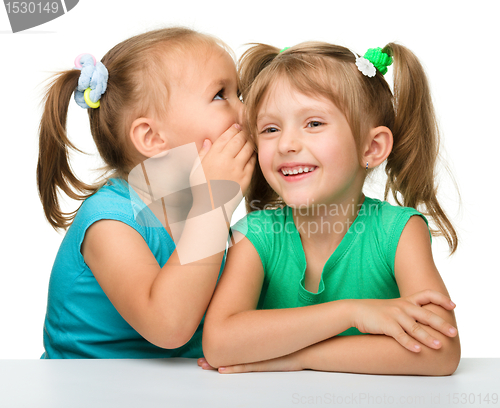 Image of Two little girls are chatting