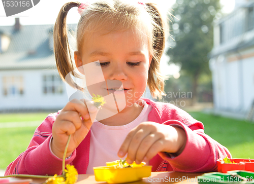 Image of Cute little girl on playground