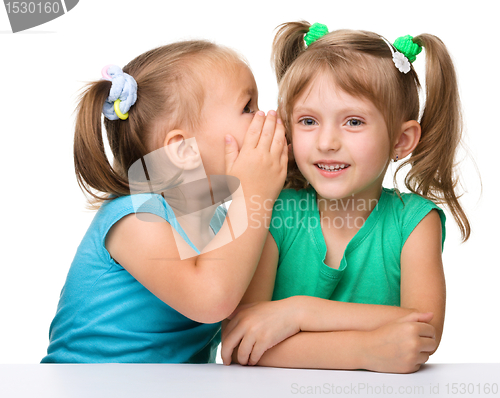 Image of Two little girls are chatting