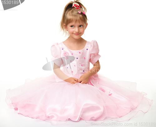 Image of Cute little girl in pink dress