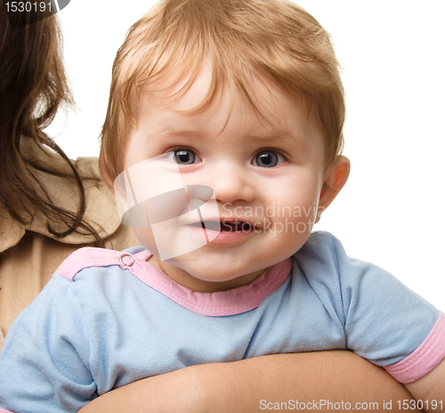 Image of Cute little boy in mother's hands