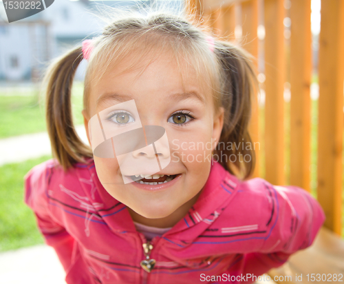 Image of Cute little girl on playground