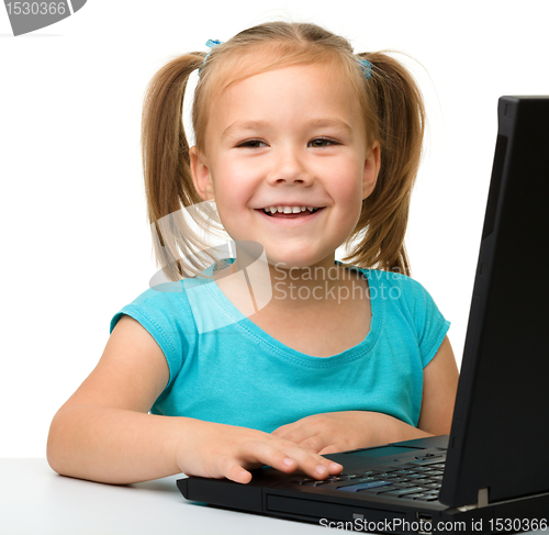 Image of Little girl with laptop