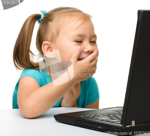 Image of Little girl with laptop