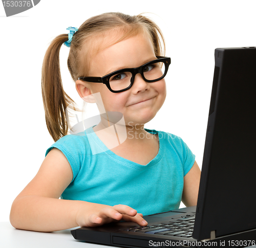 Image of Little girl with laptop