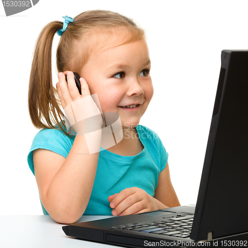 Image of Little girl with laptop