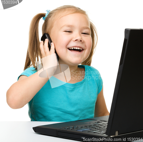 Image of Little girl with laptop