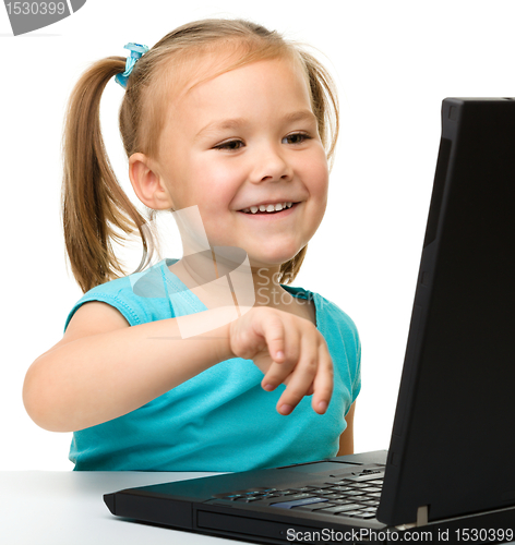 Image of Little girl with laptop