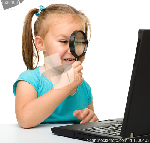 Image of Little girl with laptop