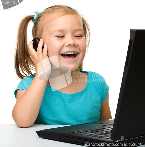 Image of Little girl with laptop
