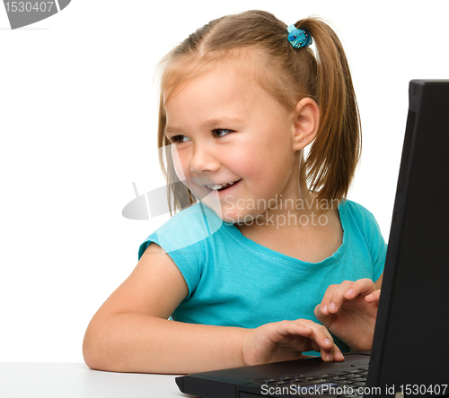 Image of Little girl with laptop