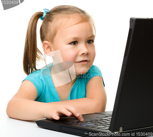Image of Little girl with laptop
