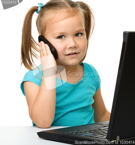 Image of Little girl with laptop