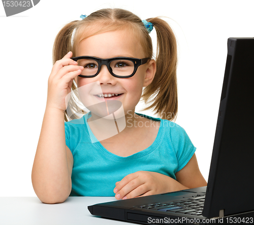 Image of Little girl with laptop