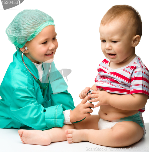 Image of Children are playing doctor with stethoscope