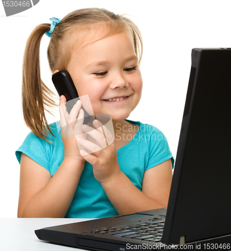 Image of Little girl with laptop