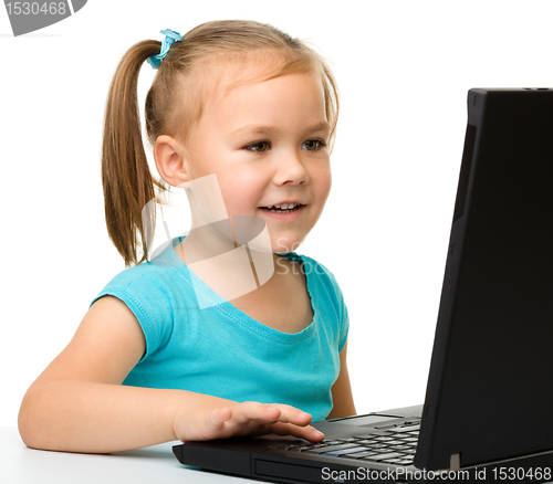 Image of Little girl with laptop