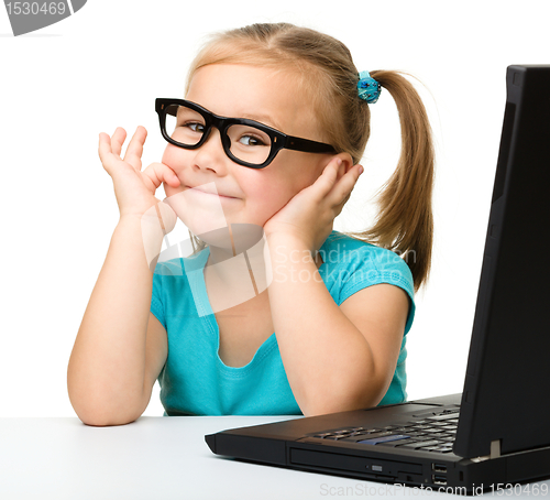 Image of Little girl with laptop