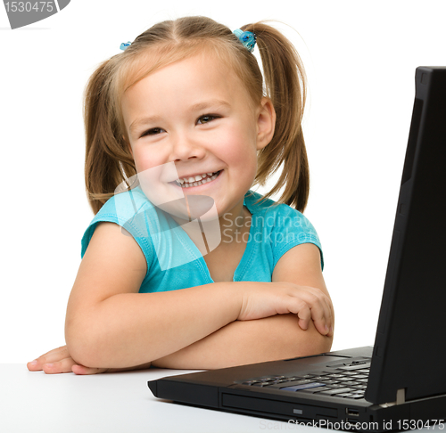 Image of Little girl with laptop