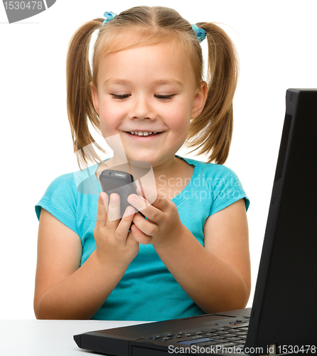 Image of Little girl with laptop