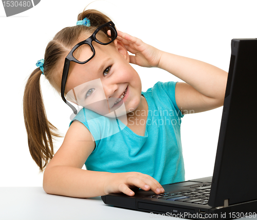 Image of Little girl with laptop