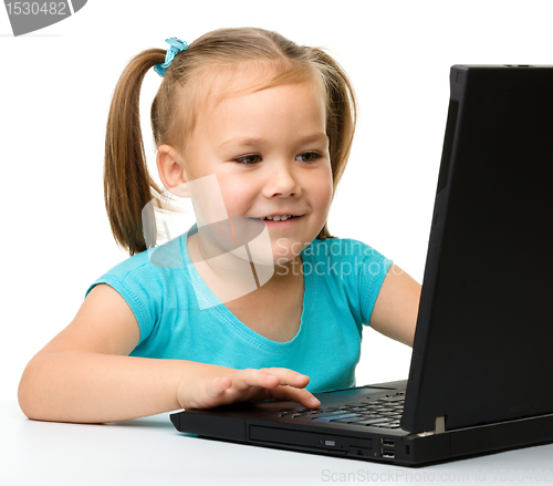 Image of Little girl with laptop
